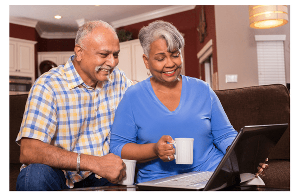 Couple looking at laptop