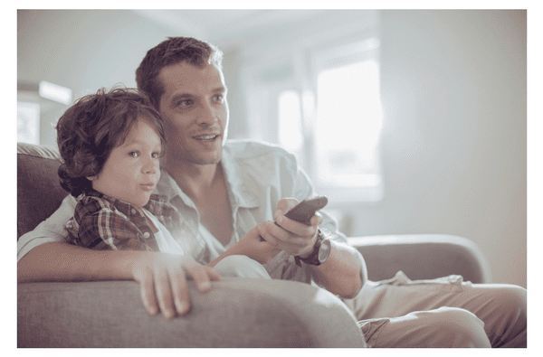 Father and son watching TV