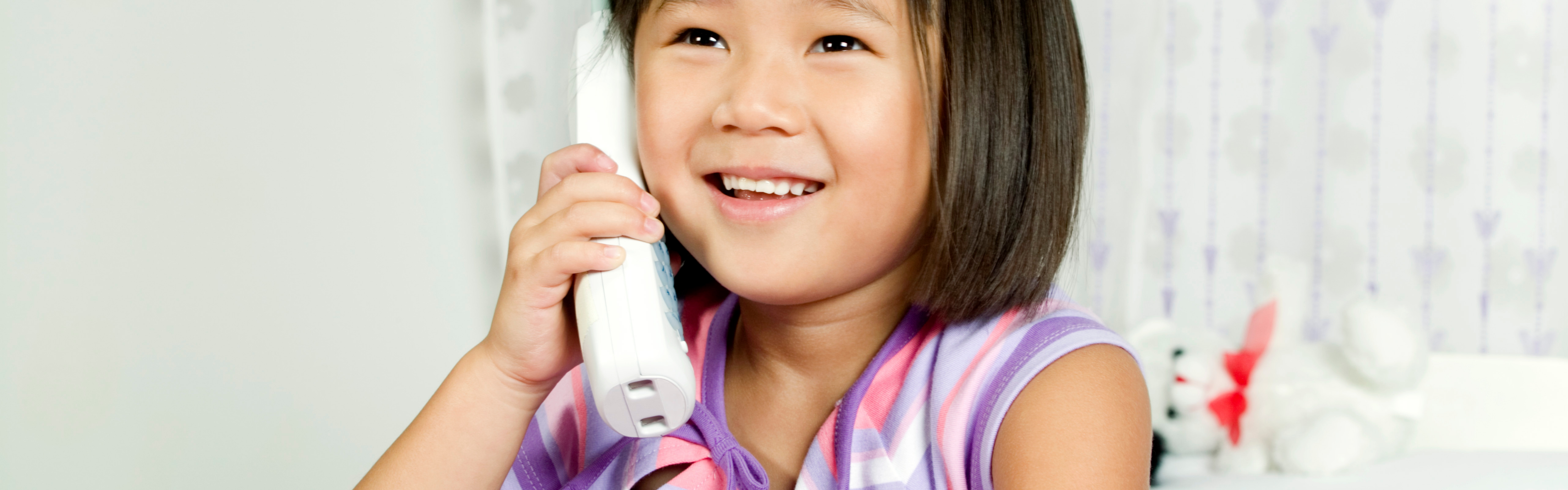 Little girl using phone