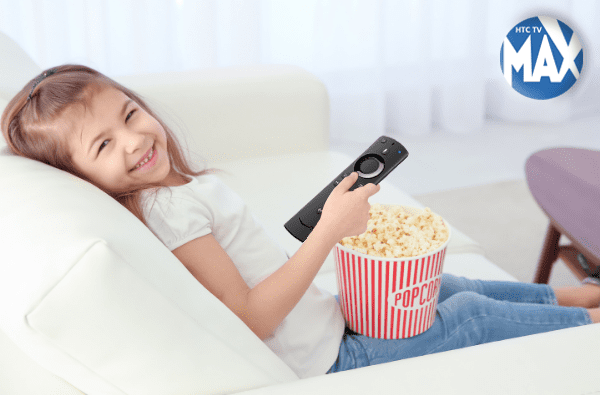 Little girl smiling on couch