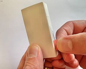 Battery with pull tab