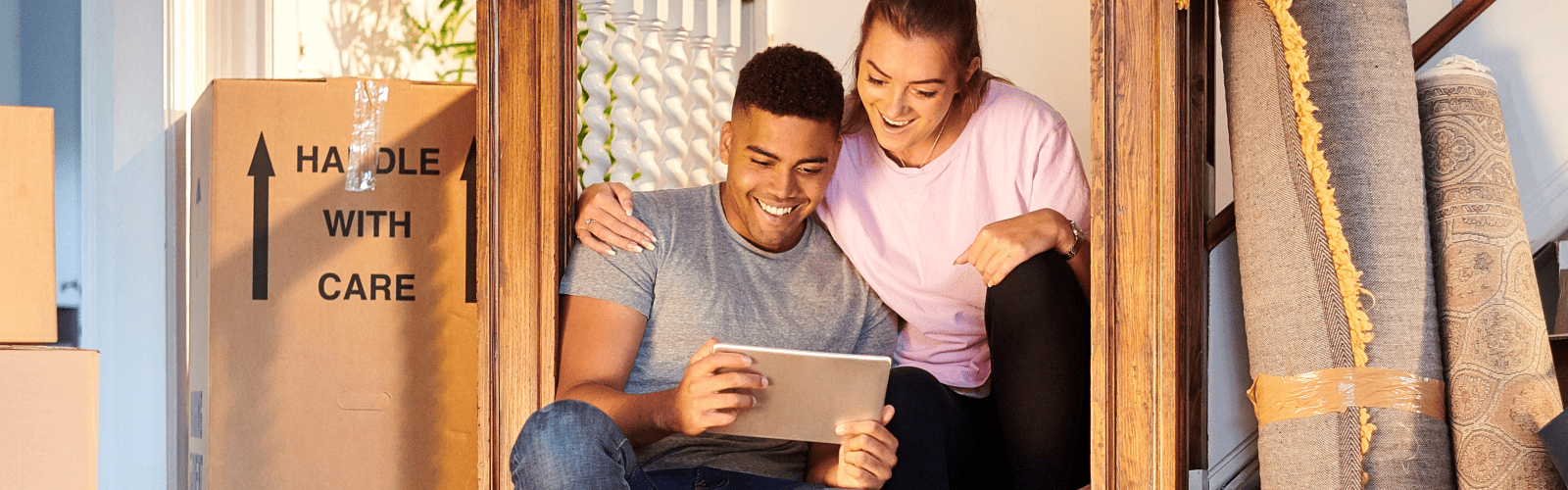 Couple looking at laptop