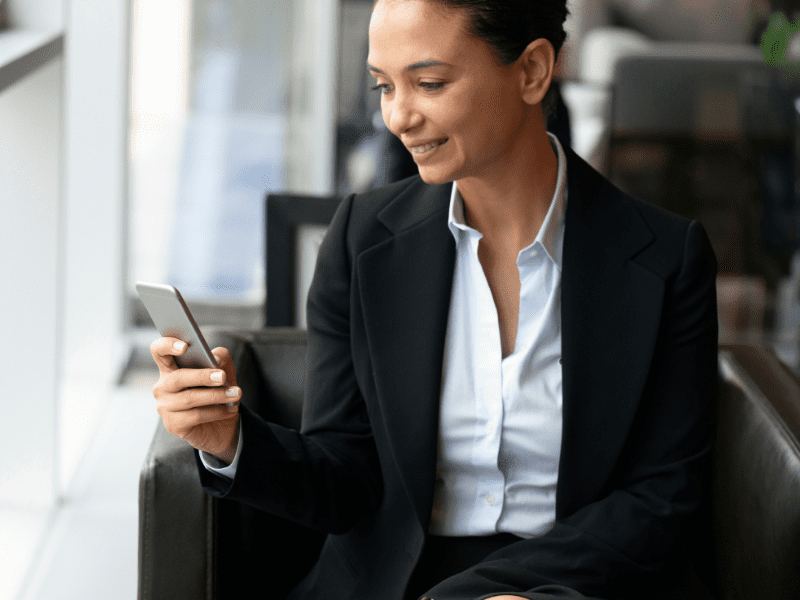 woman looking at her phone.