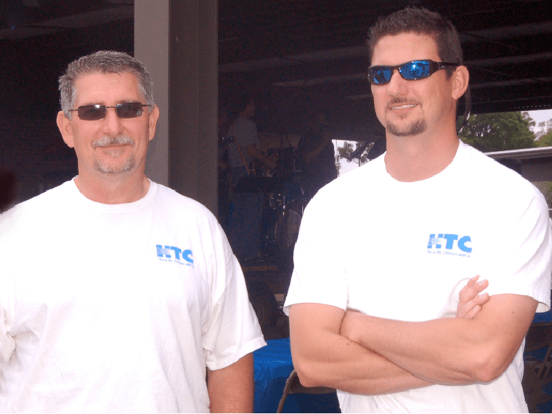 HTC employees hanging out at a company picnic.