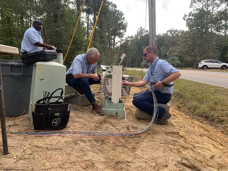 HTC team in the field working on fiber installation/connection.