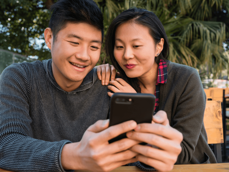 Couple using phone