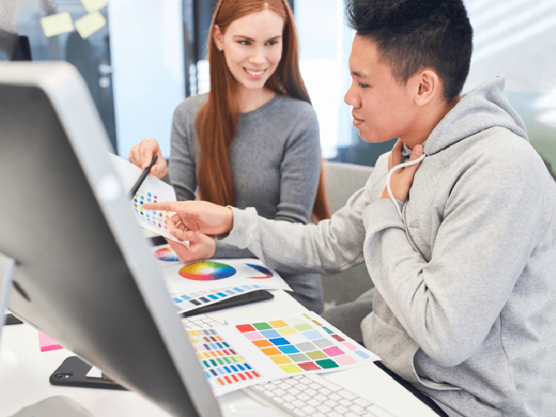 Man and women looking at color swatches