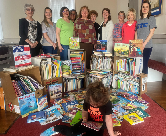 Women working with literacy charity.