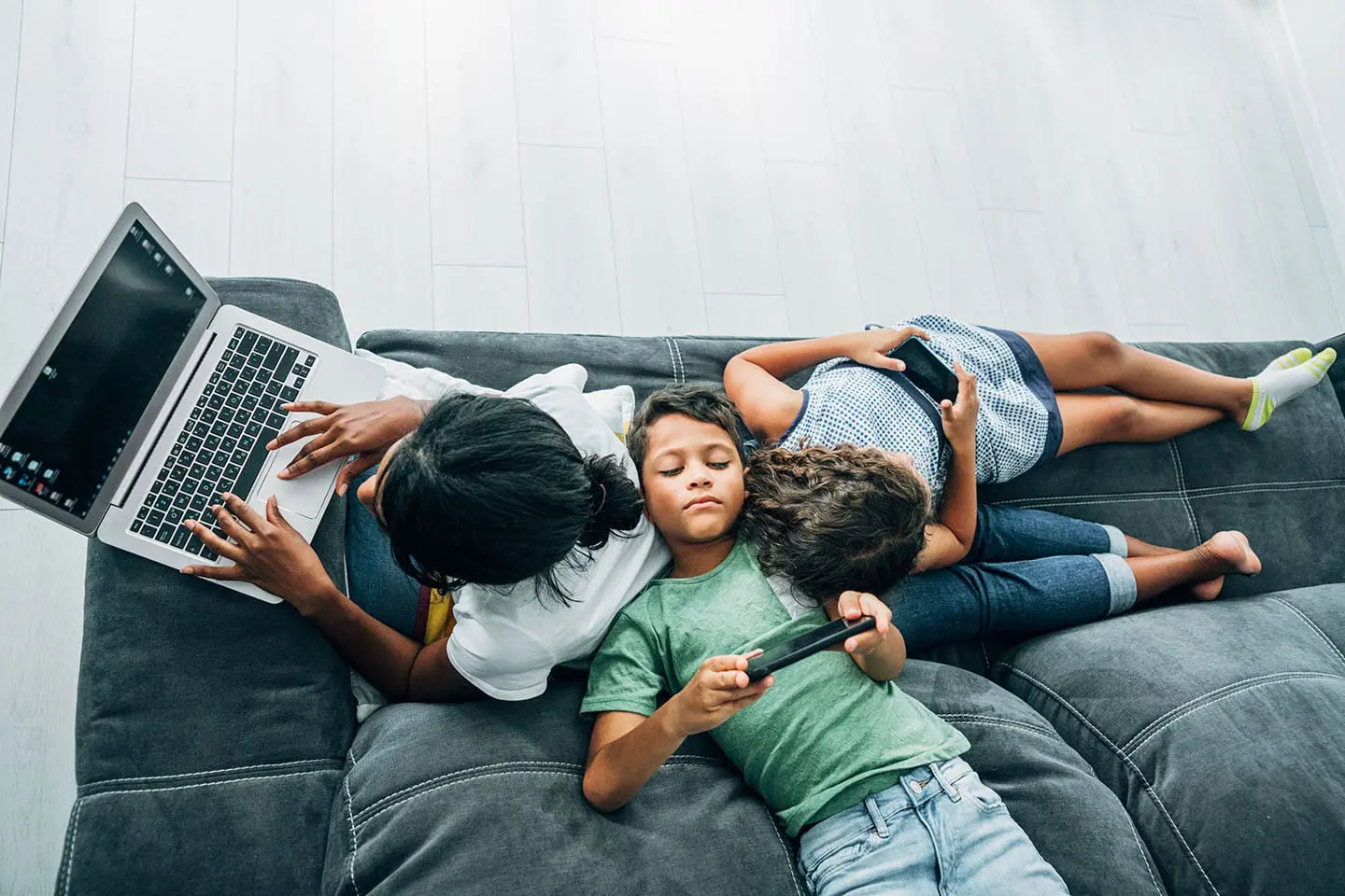 Family relaxing on couch