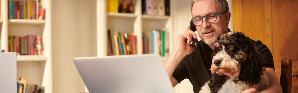 Man on the phone in his home office