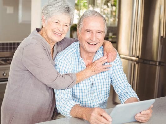 Older couple using tablet.