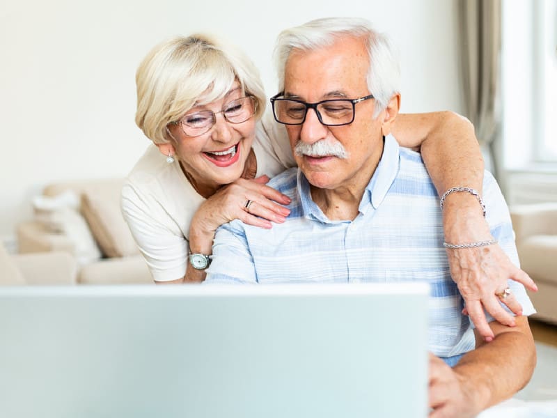 Older couple using a video chat.