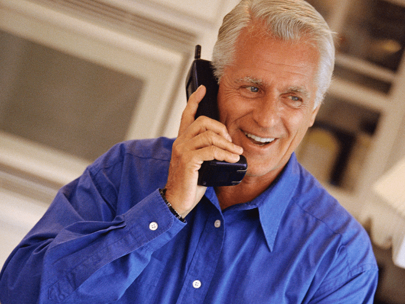 Man on a cordless phone