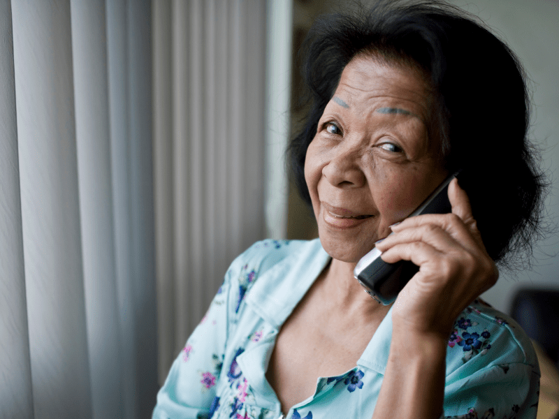 Older woman on mobile phone.