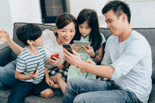 Family using their devices together