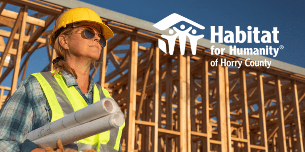 Woman architect overseeing a home building project for Habitat for Humanity