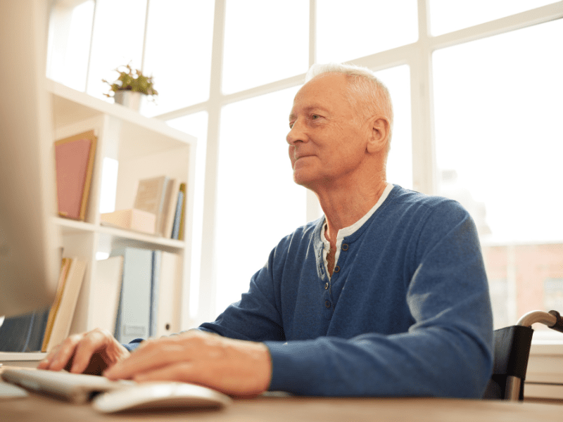 Older man using a computer