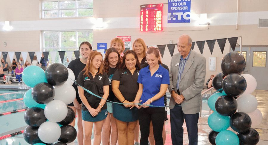 HTC ribbon cutting at the YMCA as scoreboard sponsors