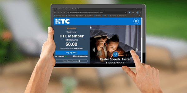 Person looking at their HTC account on a tablet