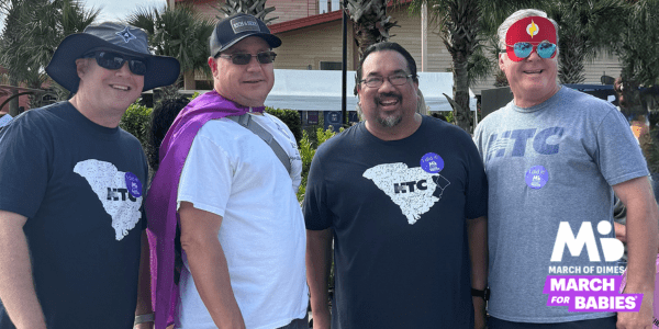 Group of men dressed up for the March of Dimes "March of Babies"