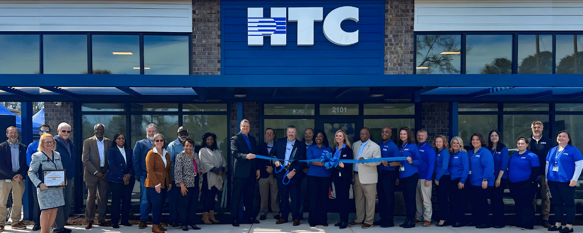 HTC employees and local Georgetown representatives at the grand reopening of HTC Georgetown office