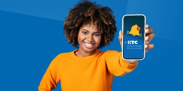 woman holding out phone with HTC text message