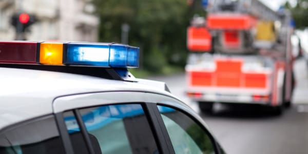 police cruiser and firetruck at the scene of an incident