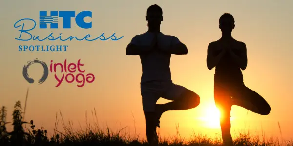couple doing yoga at sunrise