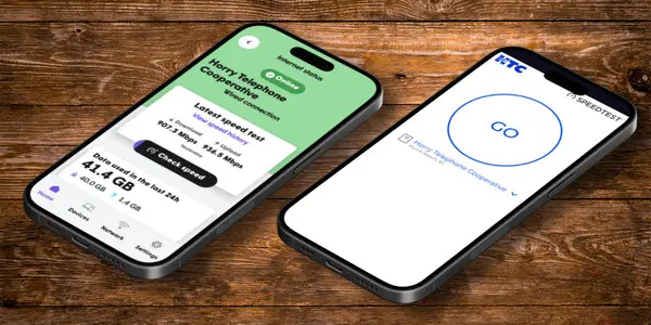 two phones running a speed test through netracer and plume home app.