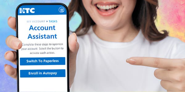 woman signing up for AutoPay and Paperless in HTC My Account